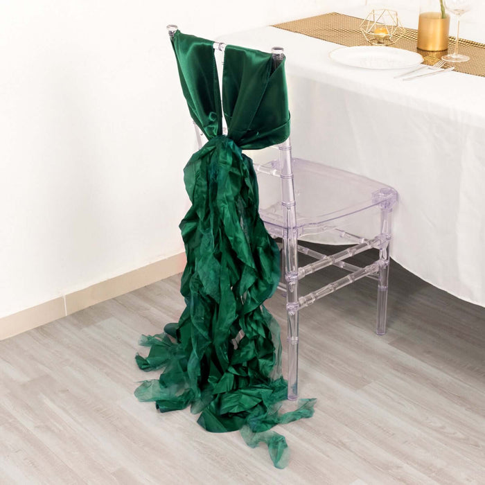 Green satin chair sash draped elegantly on a clear acrylic chair.