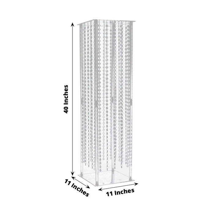 Clear acrylic display tower, 40 inches tall, 11 inches wide.