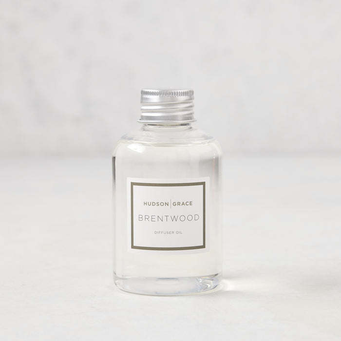 Hudson Grace Brentwood Diffuser Oil Refill, clear glass bottle with silver cap and white label.