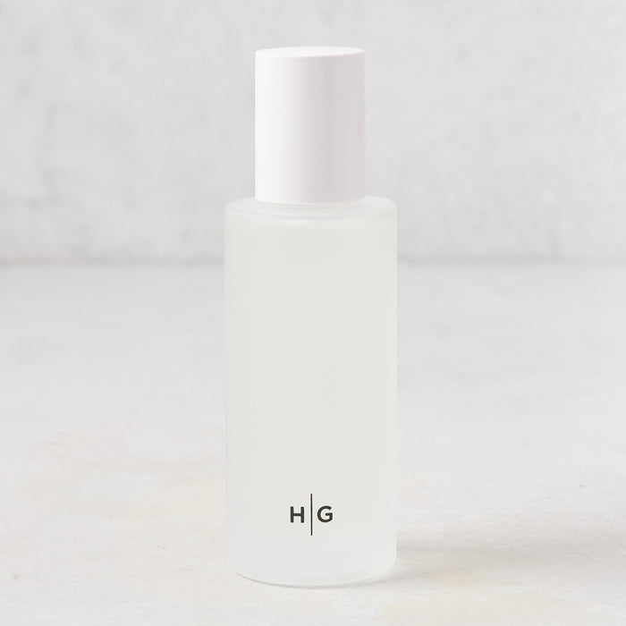 Hudson Grace Brentwood Room Spray, 5.08 oz, in a frosted glass bottle with white cap and HG logo.