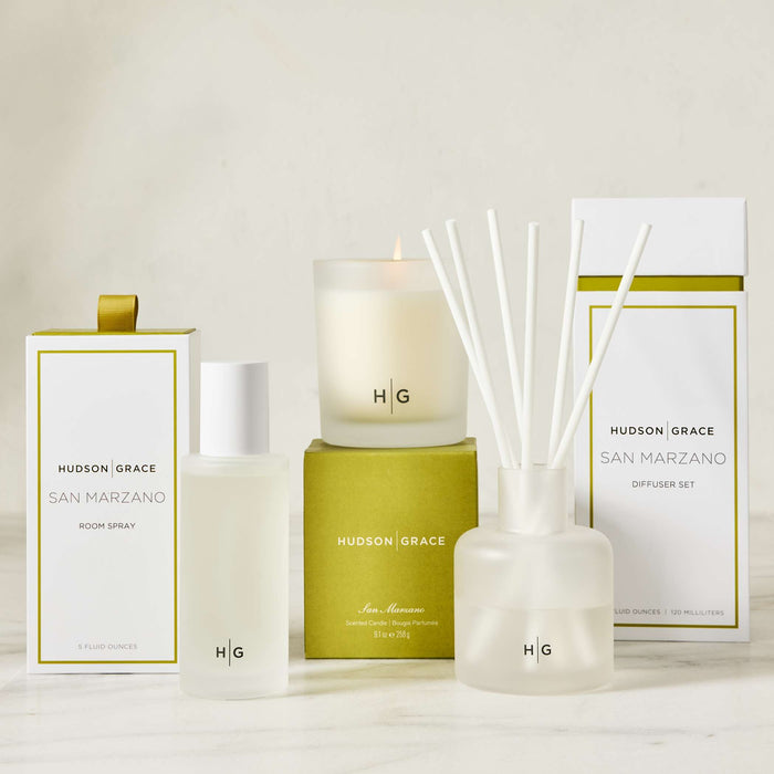Hudson Grace San Marzano room spray, candle, and diffuser set in white and olive green packaging.