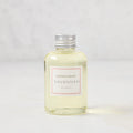 Hudson Grace Savannah scented reed diffuser oil refill, 4oz clear glass bottle with silver cap and pink label.