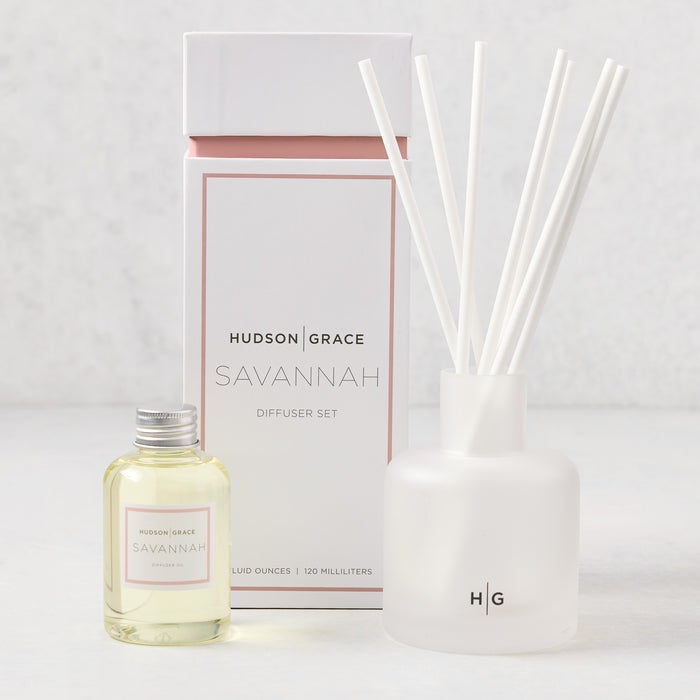 Hudson Grace Savannah diffuser set: clear oil refill bottle, frosted white glass diffuser, white reeds, and white box.