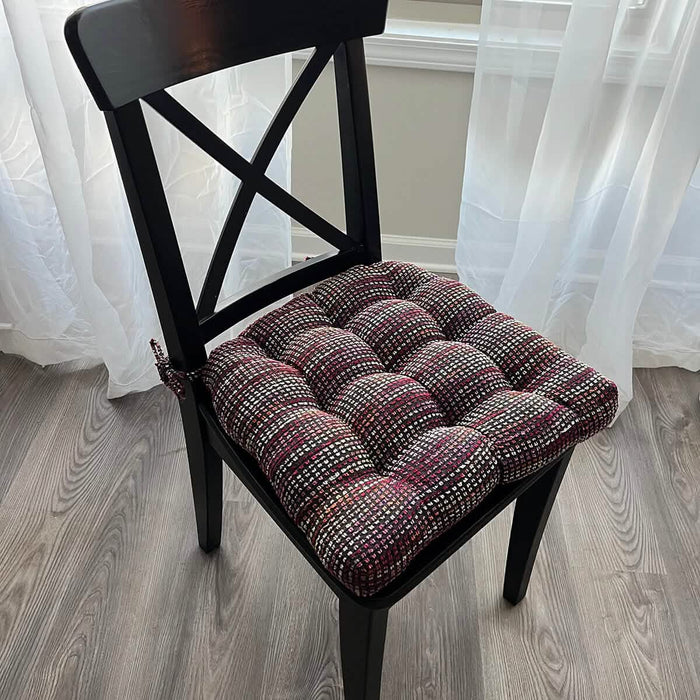 Louisa Multi dining chair pads placed on wooden dining chair