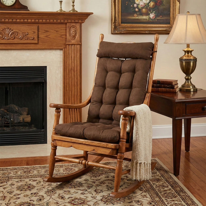 Wooden rocking chair with brown cushions in a cozy living room setting.
