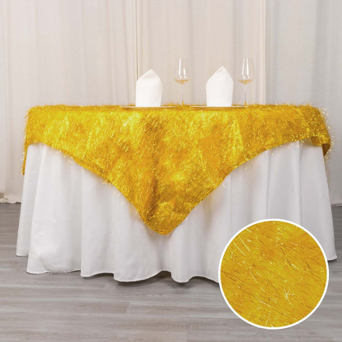 Yellow table runner with shimmering texture displayed on a white tablecloth.