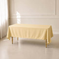 beige polyester rectangle tablecloth on a table