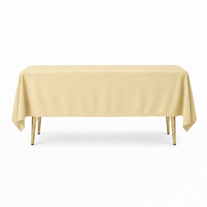 beige rectangle tablecloth on a wooden table