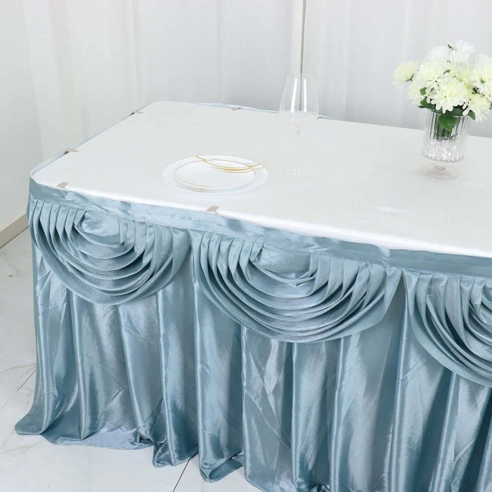 Elegant teal tablecloth with pleated design and white tabletop