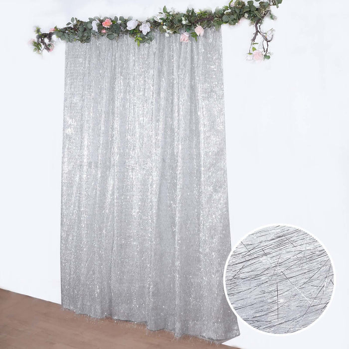 Silver shimmer curtain with floral garland decoration