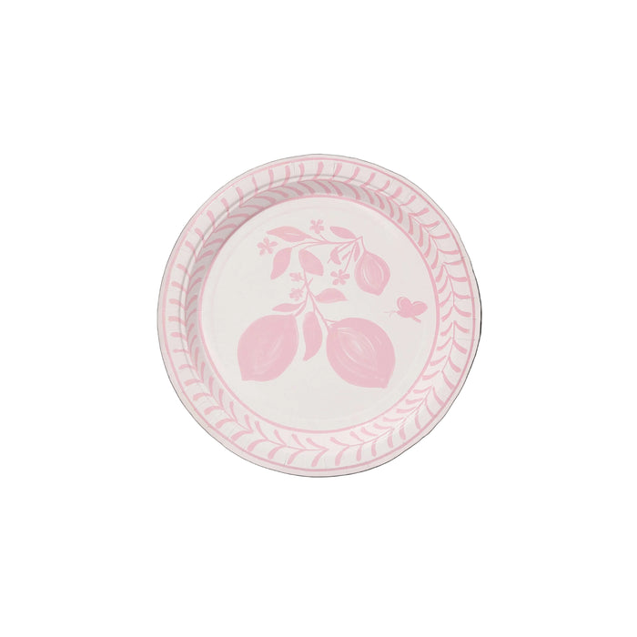 Round plate with citrus fruit design on a white background
