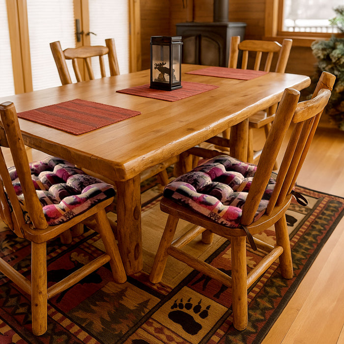 Close-up detail view of Woodlands Fairbanks dining chair cushion showing wildlife pattern